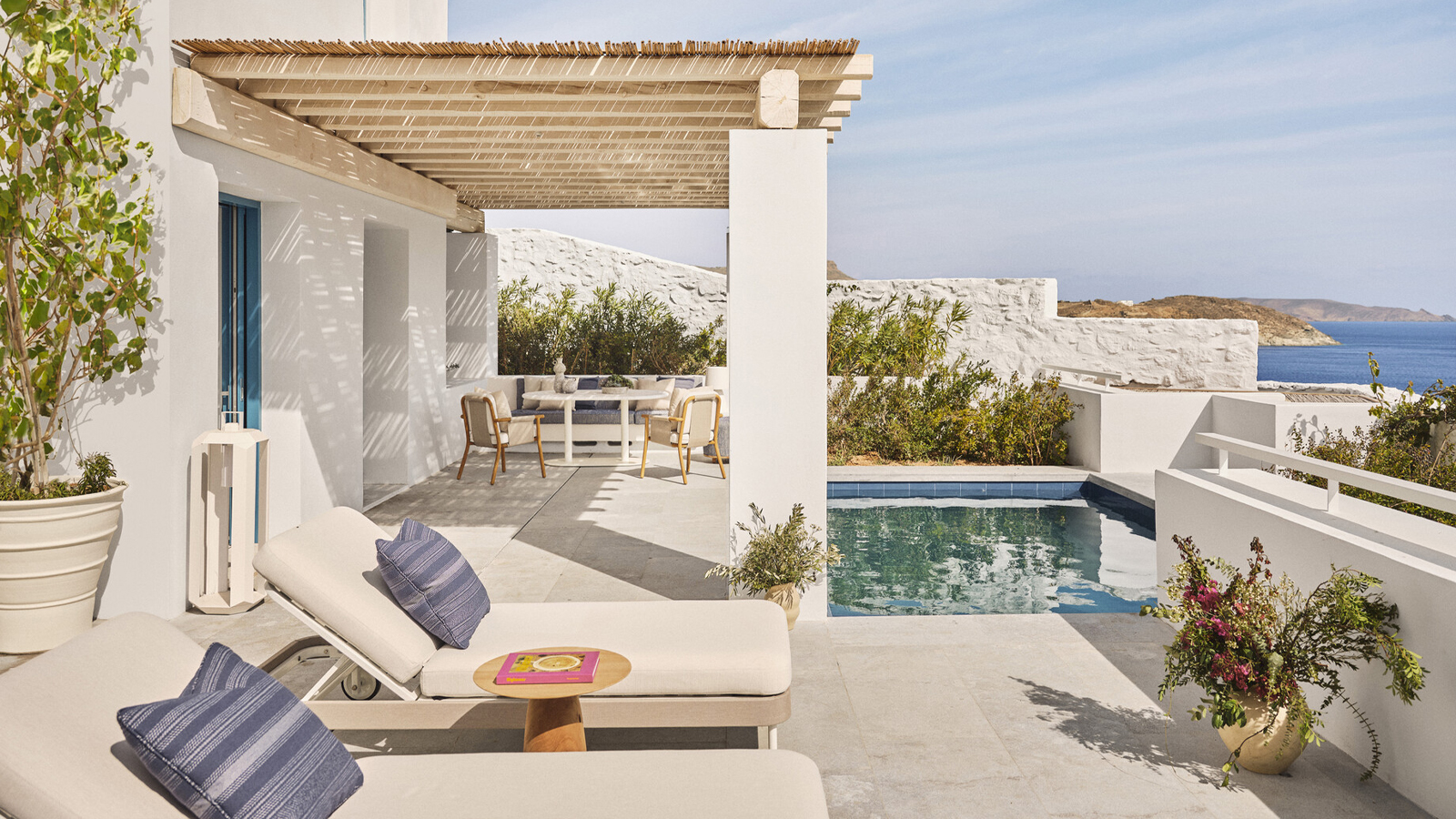 Whitewashed Mykonian village-style architecture at Four Seasons Mykonos with sea views