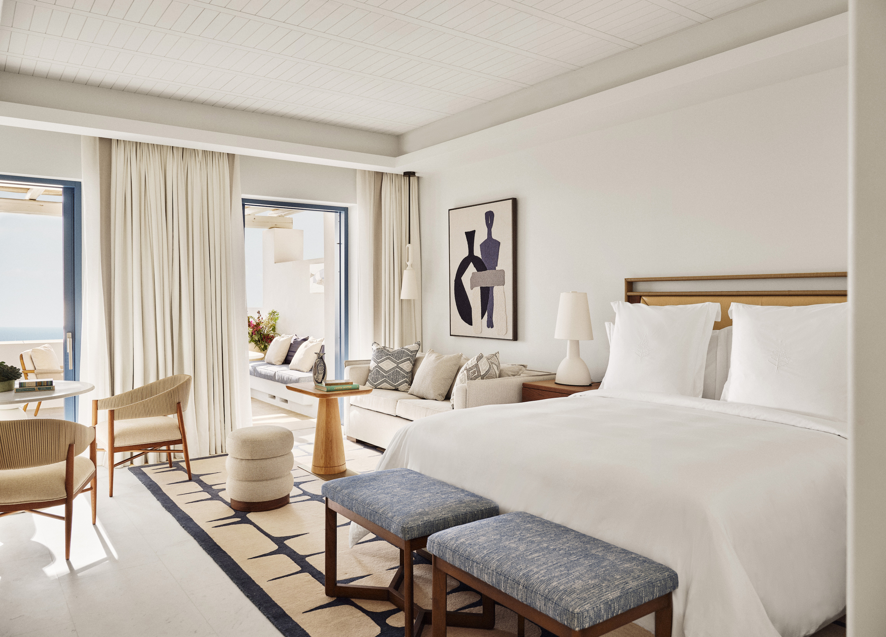 Executive suite interior at Four Seasons Mykonos with plunge pool terrace and Aegean views